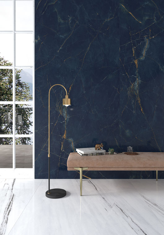 Bench on white porcelain slab floor and for wall used blue porcelain slab